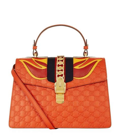 gucci sylvie flame|Gucci Sylvie Flame Shoulder Bag In Red Signature .